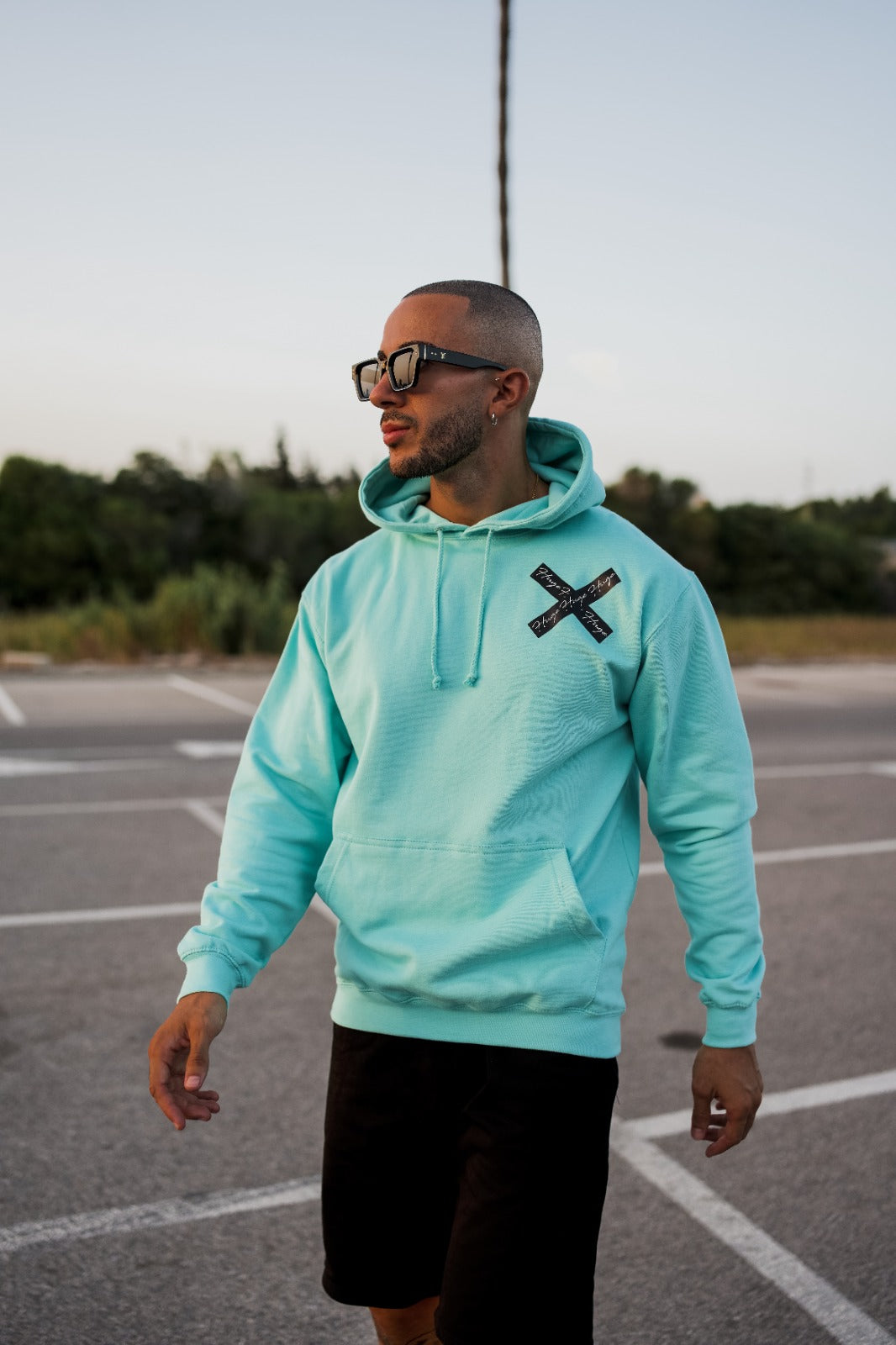 Turquoise Tape X hoodie